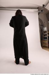 Man Adult Average White Daily activities Standing poses Coat